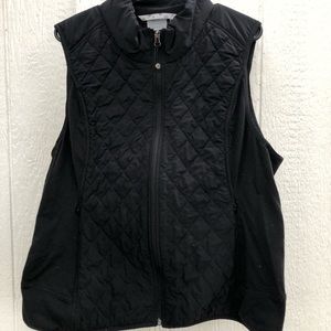 Athleta black vest size 1X, in great condition, would be nice with a turtleneck.